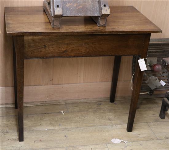 An oak side table W.84cm